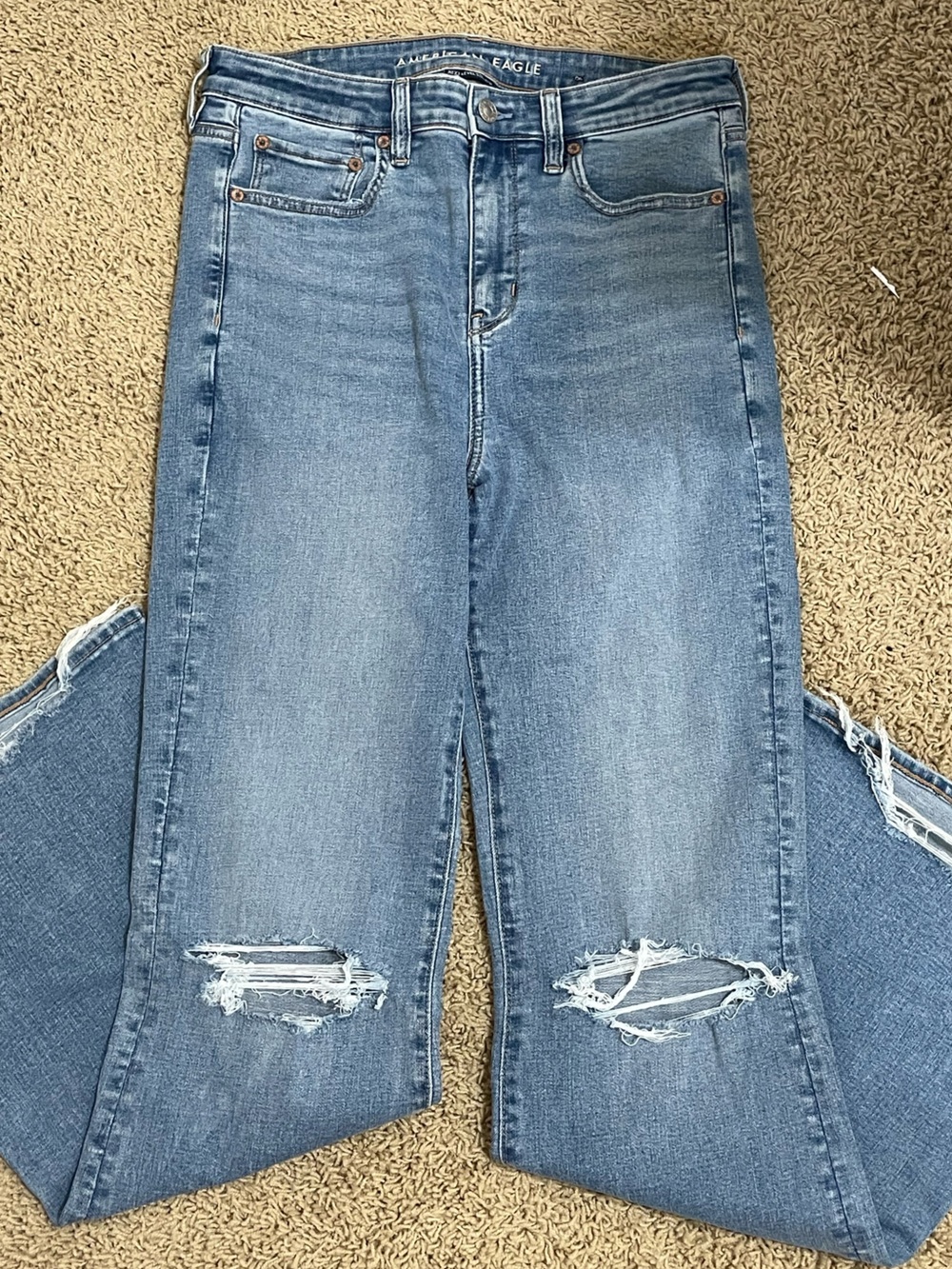American Eagle High-Rise Light Blue Flared Distressed Jeans